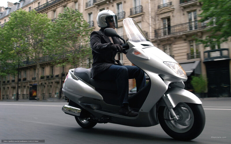 Person Riding Scooter — Silver