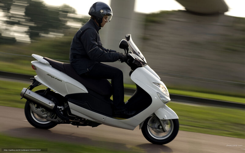 Person Riding Scooter — White, Dynamic, Sunset