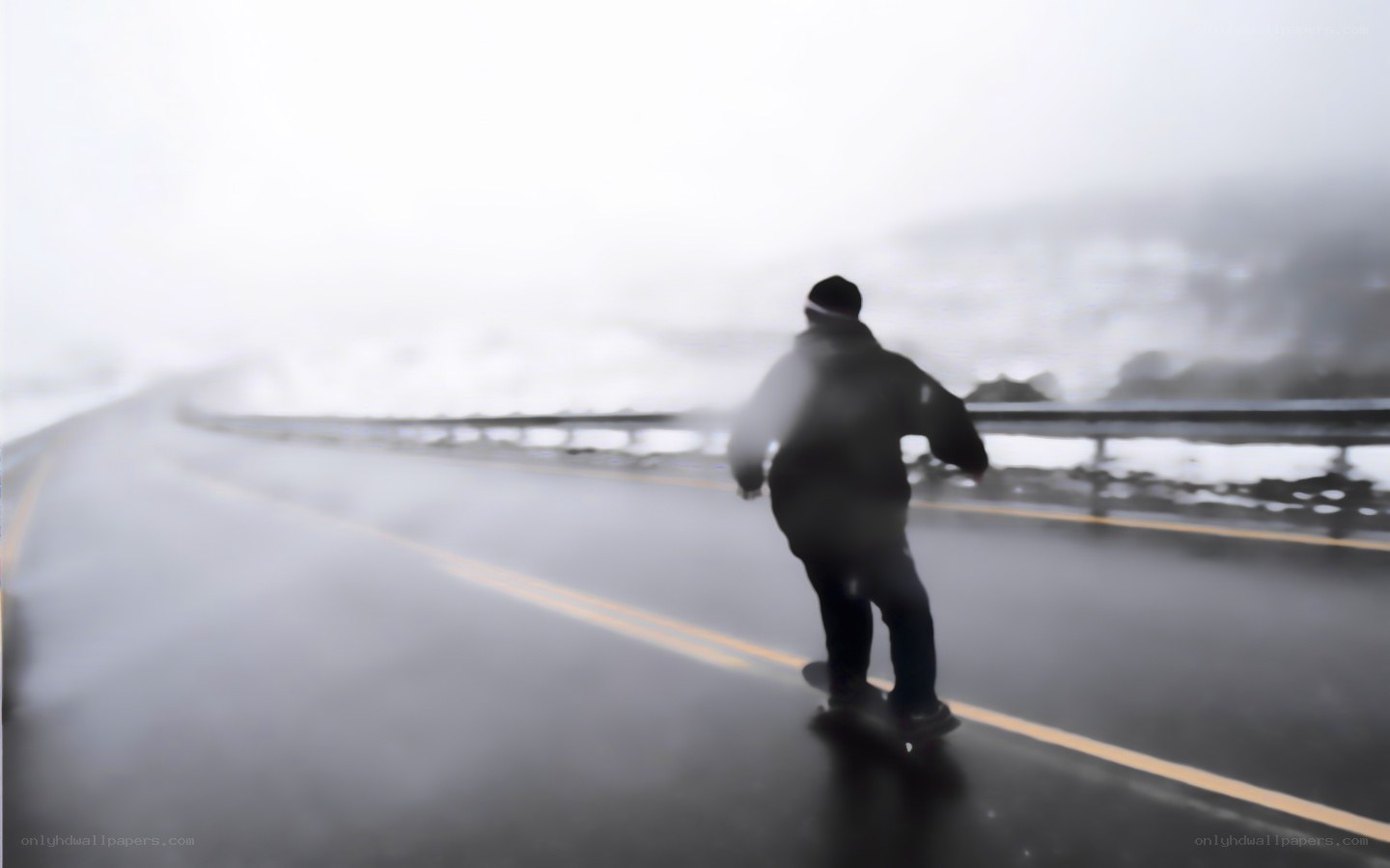 person riding skateboard on road