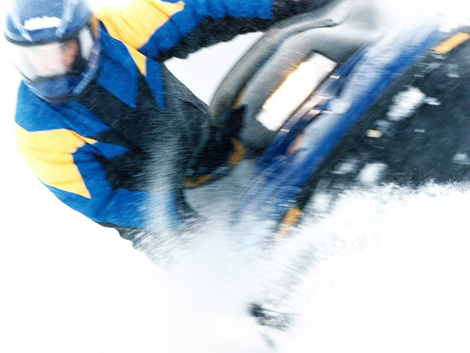 Person riding snowmobile