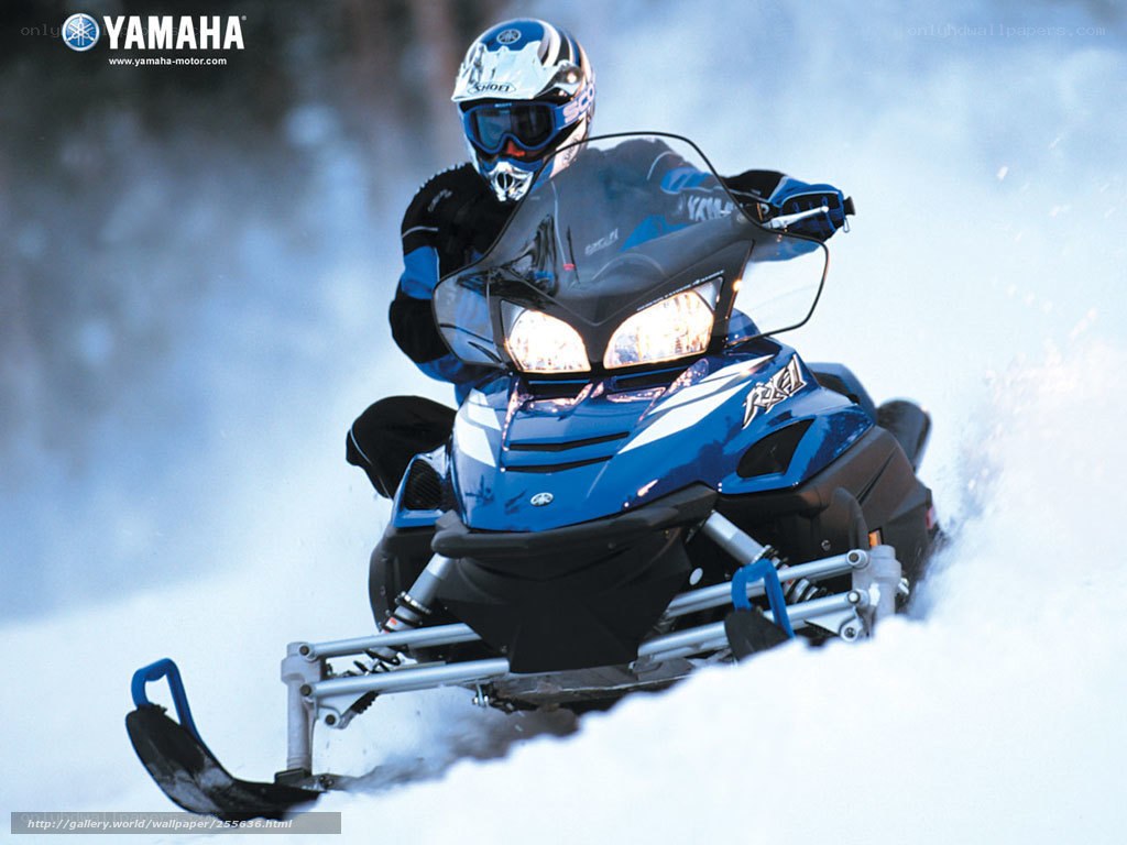 person riding snowmobile