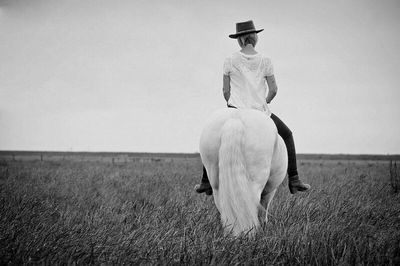 Person Riding White Horse — Black