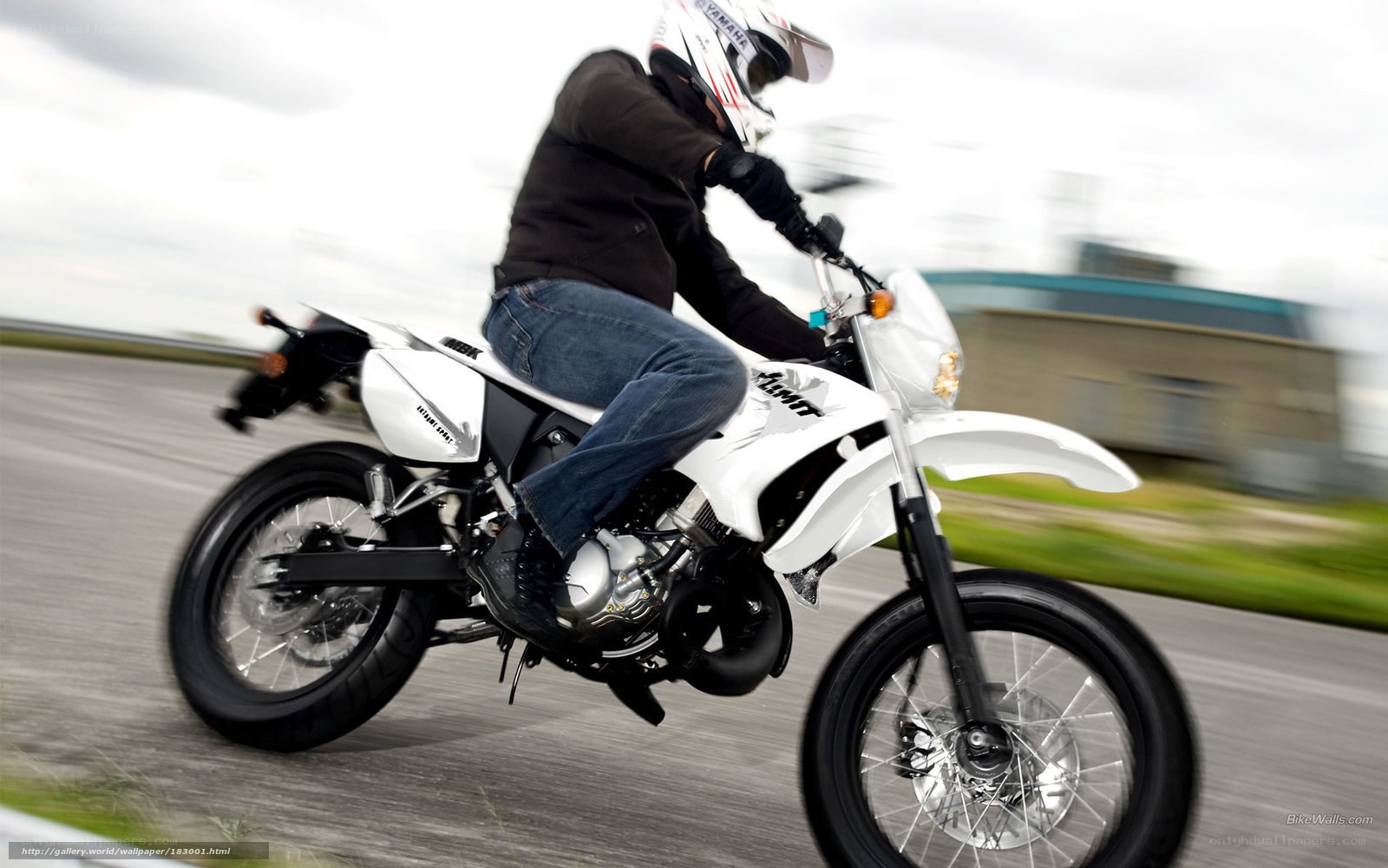 person riding white motorcycle