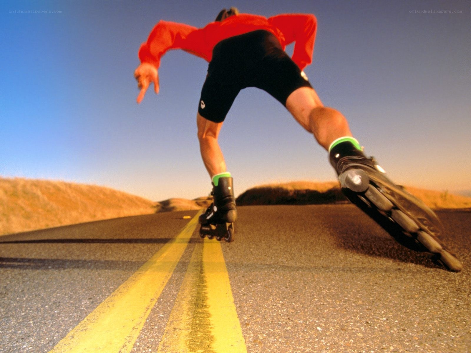 Person rollerblading on road