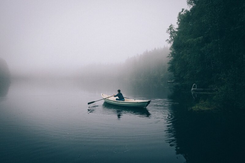 Person Rowing a Boat — Gray