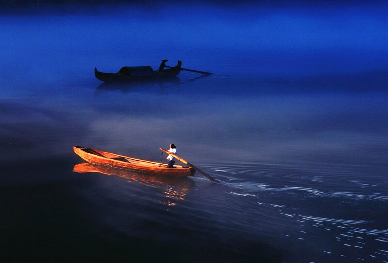 Person Rowing Boat