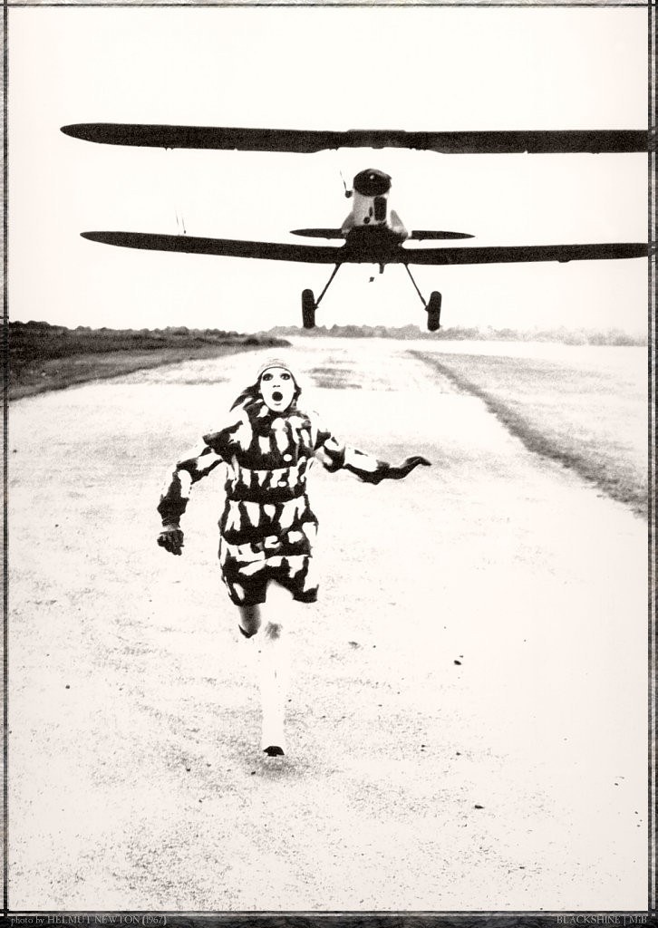 person running from airplane