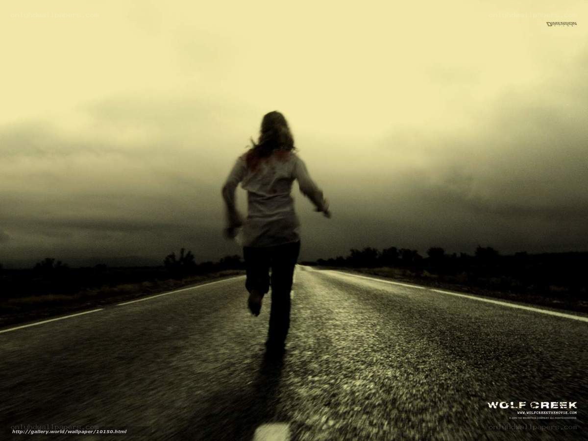 person running on a road
