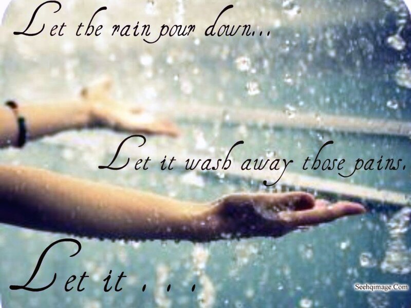 Person's Arms in Rain