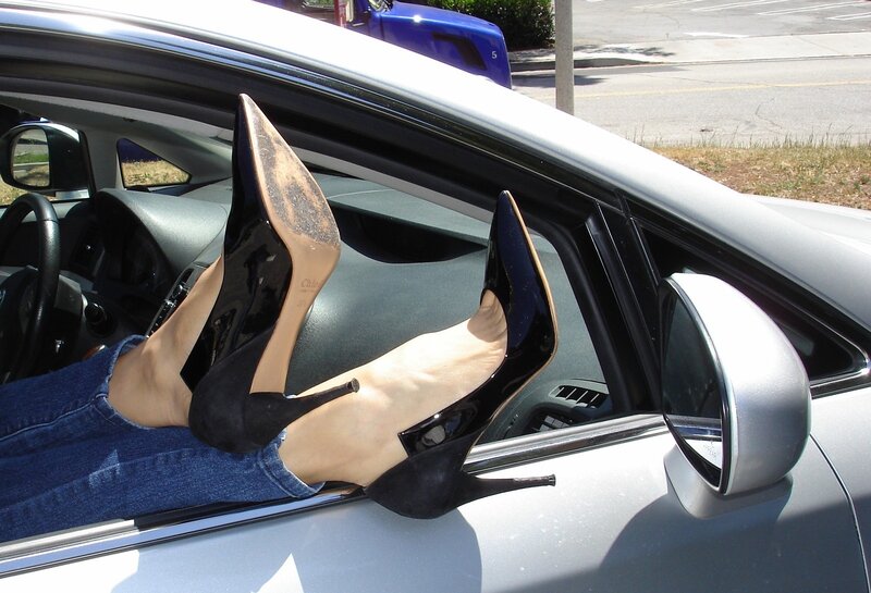 Person's Feet in Heels