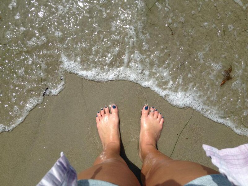 Person's Feet on Beach — Brown