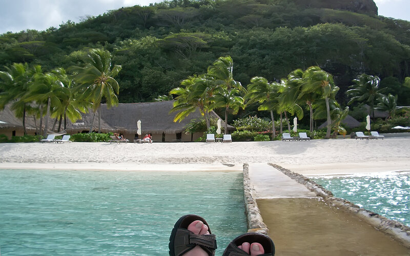 Person's Feet on Pier