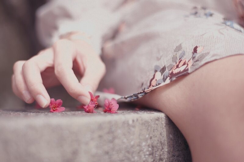 Person's Hand with Flowers
