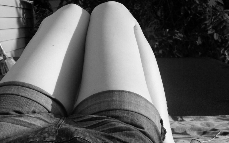 person's legs in shorts