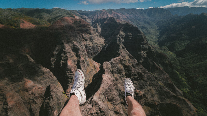 Person's Legs on Cliff Edge