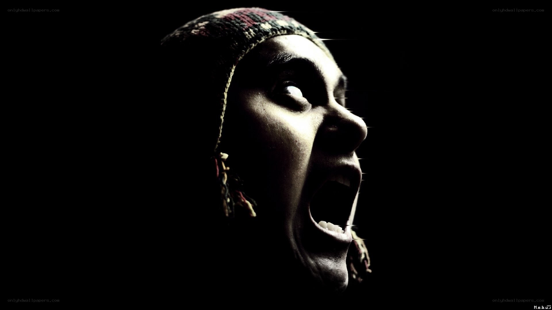 person screaming in darkness
