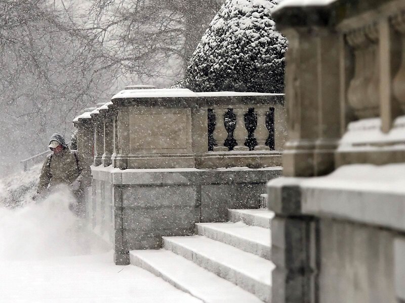Person shoveling snow in winter