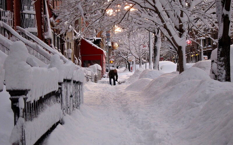 Person Shoveling Snow — White