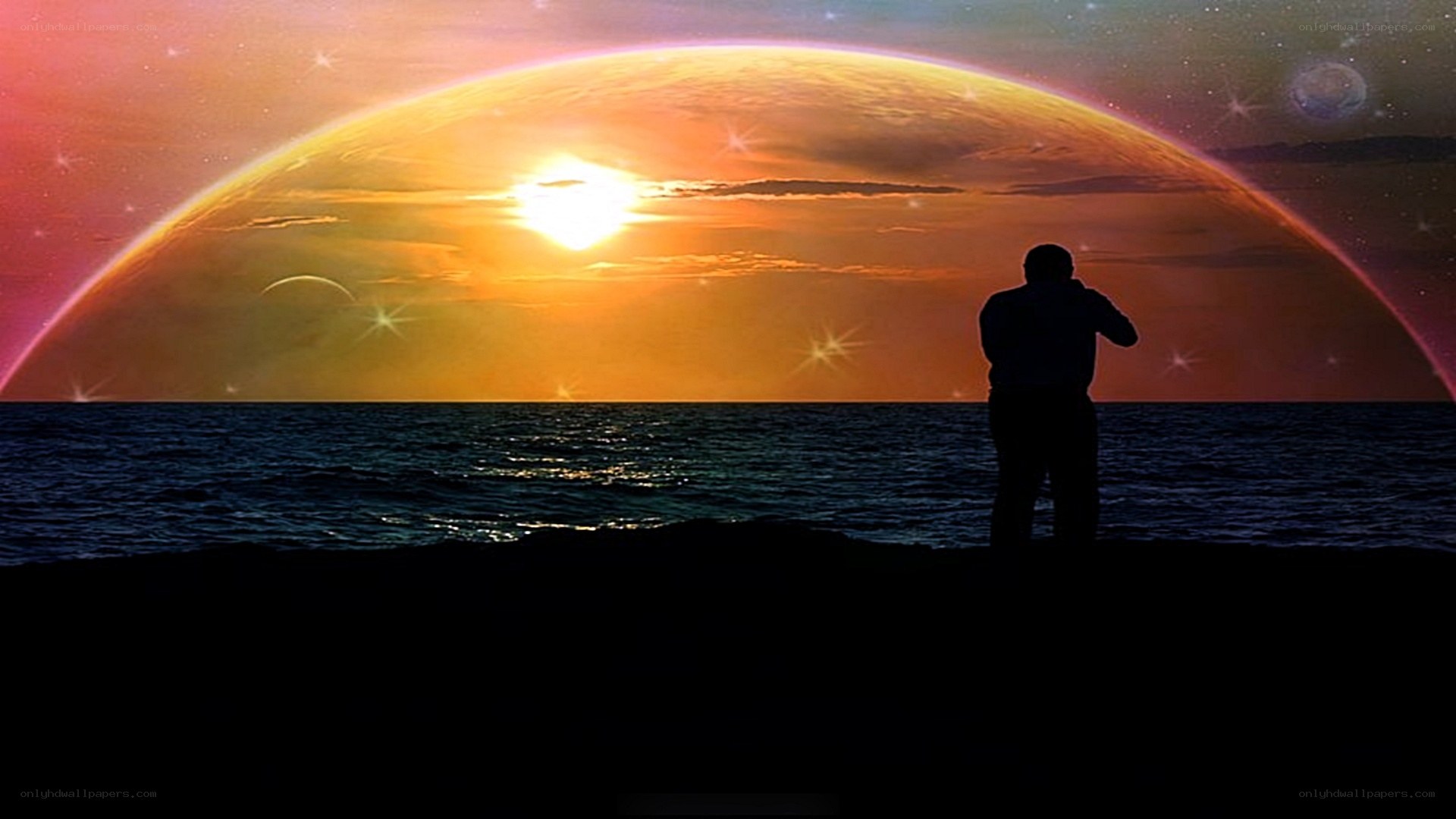 Person silhouetted against alien sunset