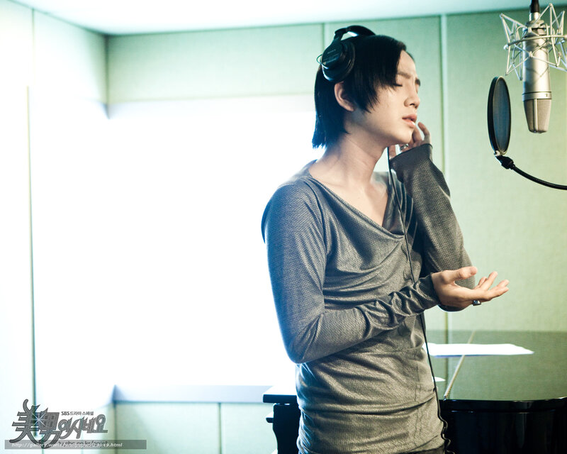 Person Singing in Studio