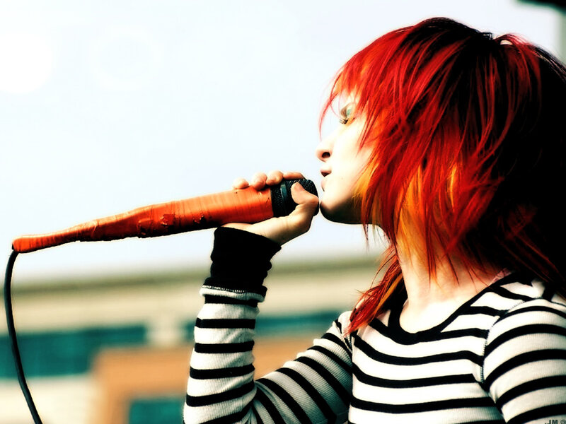 person singing into carrot microphone