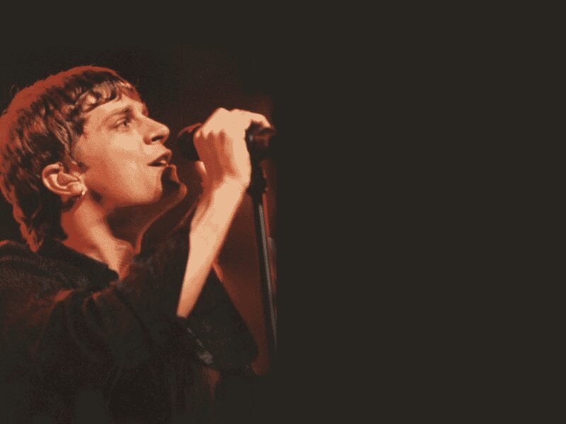 Person Singing into Microphone — Black, Dramatic