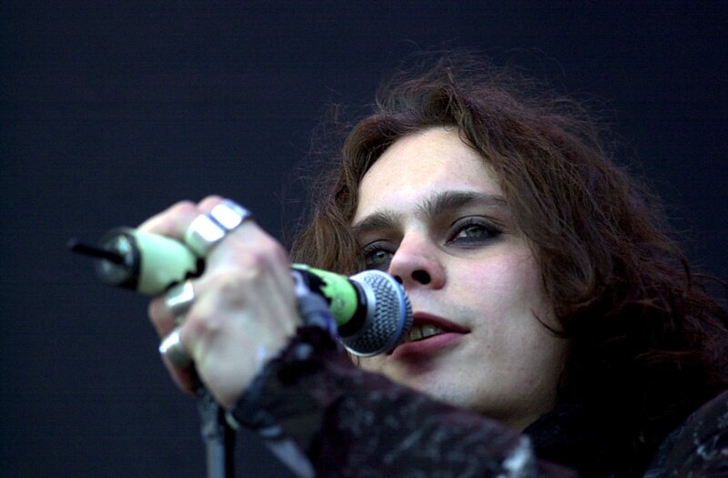 Person Singing into Microphone — Black, Intense, Photograph