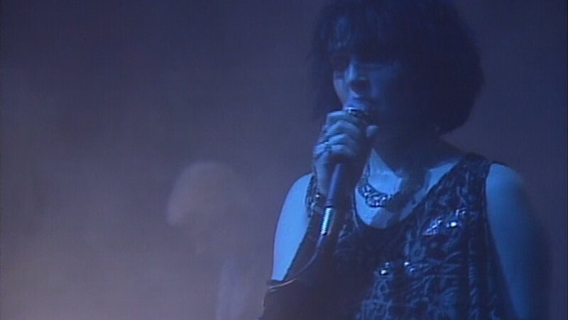 Person Singing into Microphone — Blue, Dark