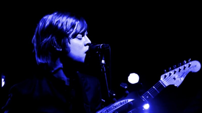 Person Singing into Microphone — Blue, Dramatic