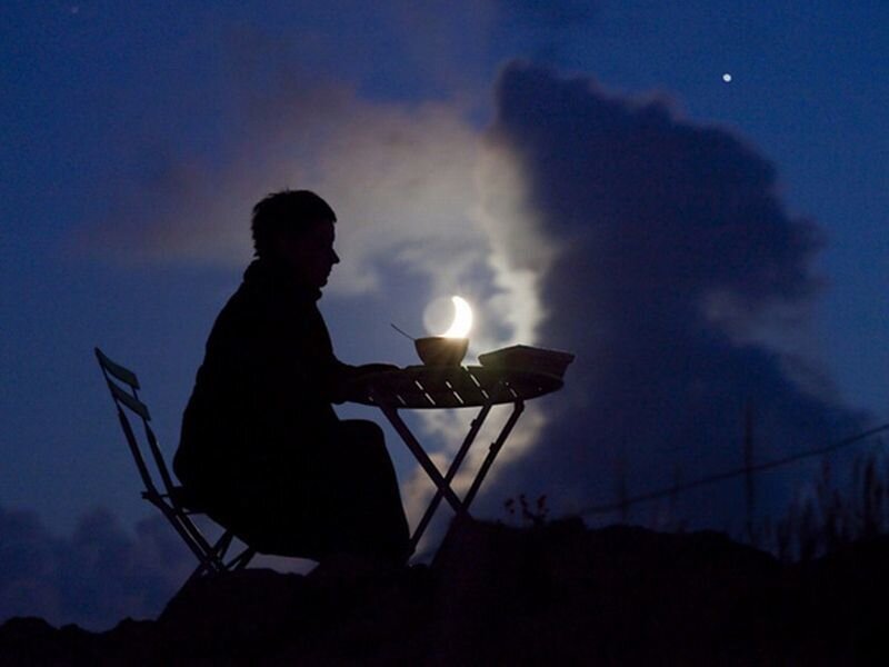 Person Sitting at Table