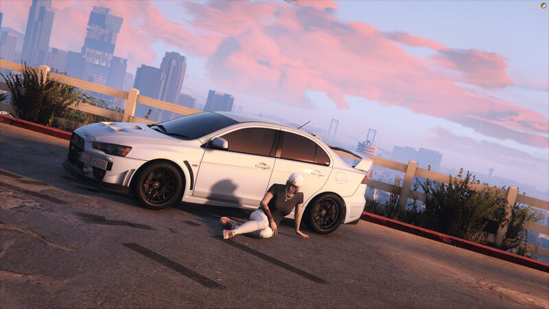 Person Sitting Beside Car