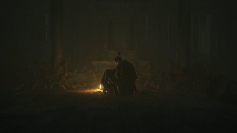 Person Sitting by Fire — Black