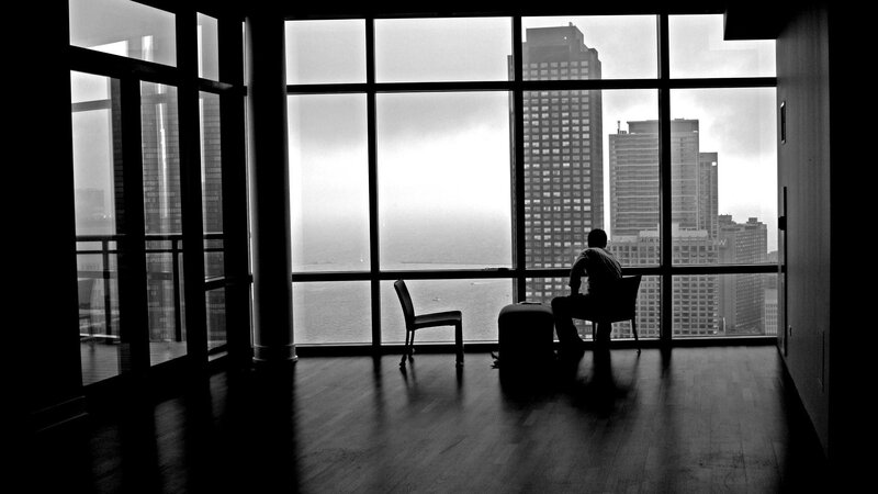 Person Sitting by Window — Black, Dramatic