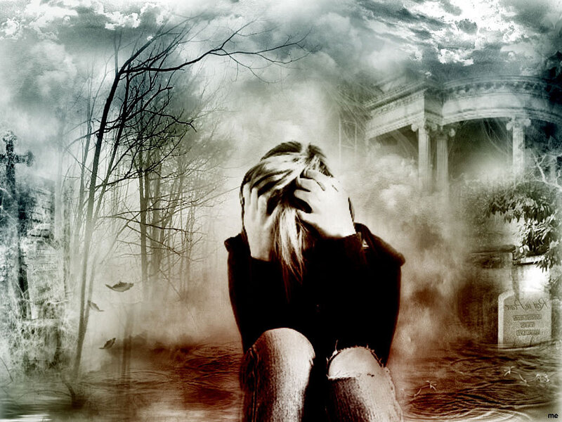 Person Sitting in Cemetery