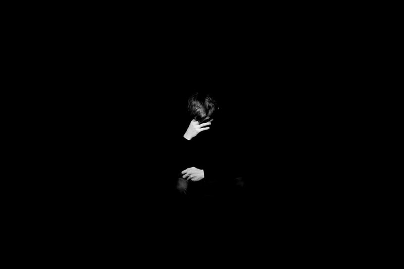 Person Sitting in Darkness — Black, Dramatic, Night