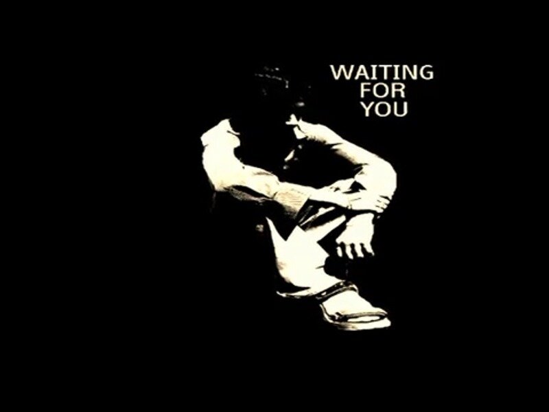 Person Sitting in Darkness — Black, Somber