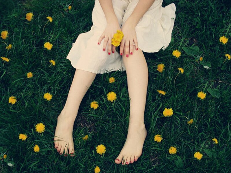 Person Sitting in Grass