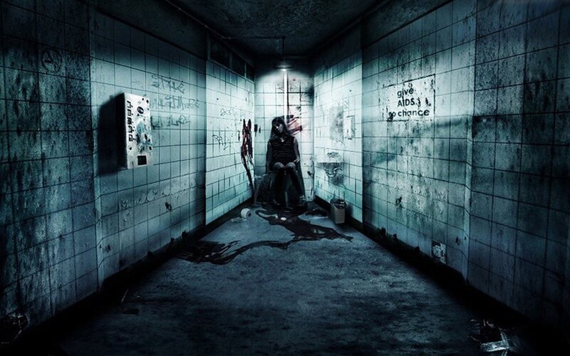 Person Sitting in Hallway