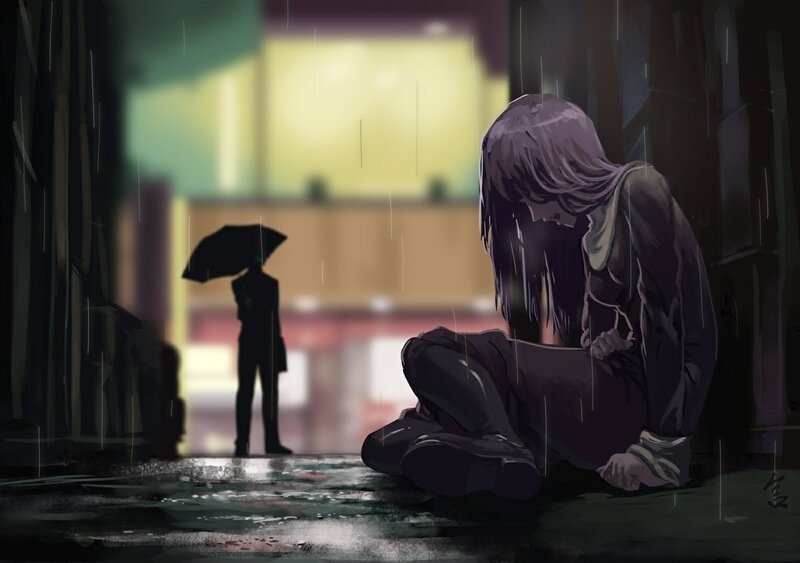 Person Sitting in Rain