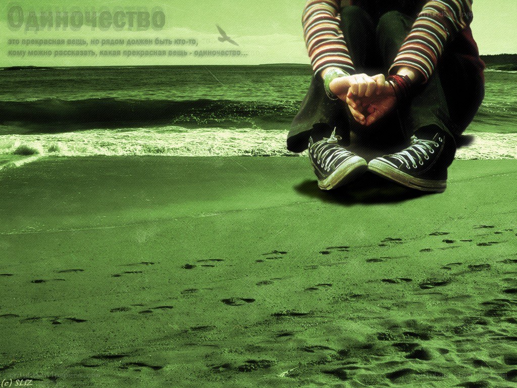 Person sitting on a beach