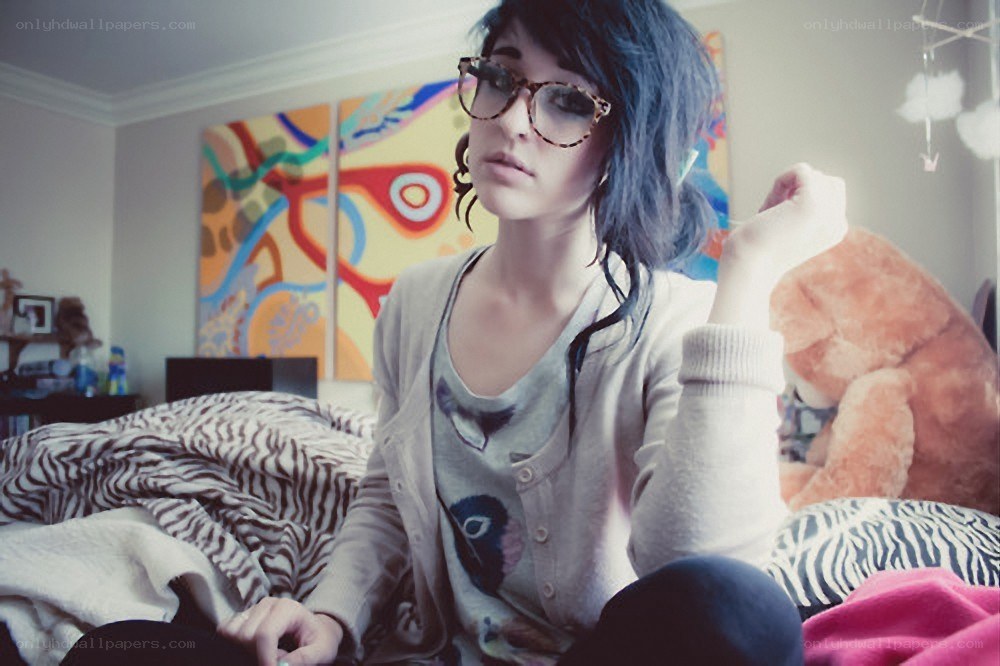 person sitting on a bed