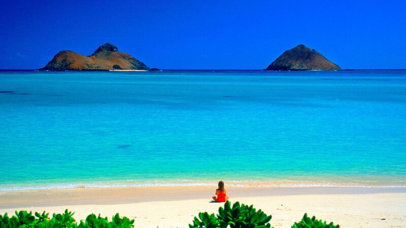 Person Sitting on Beach — Blue, Serene, Afternoon