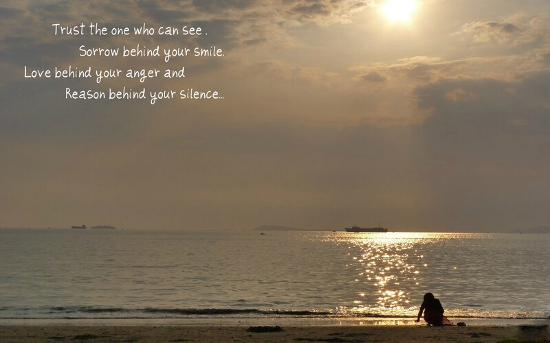 Person Sitting on Beach — Gold