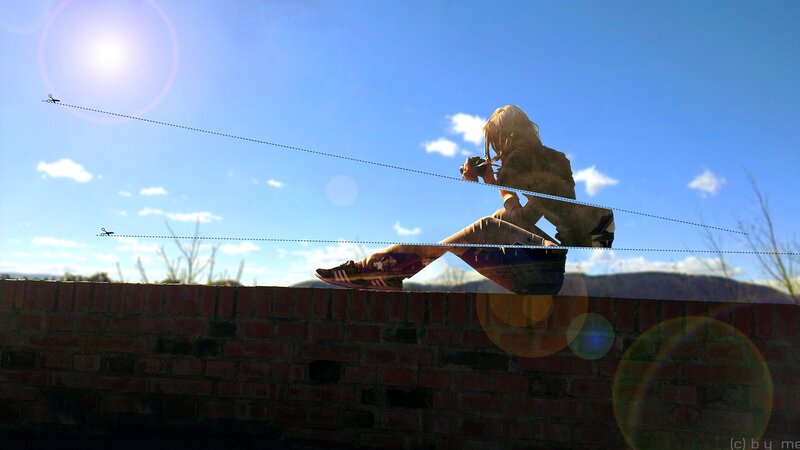 person sitting on brick wall