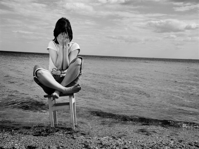 Person Sitting on Chair — Black
