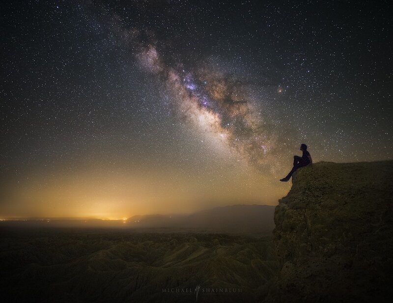 Person Sitting on Cliff — Black, Serene