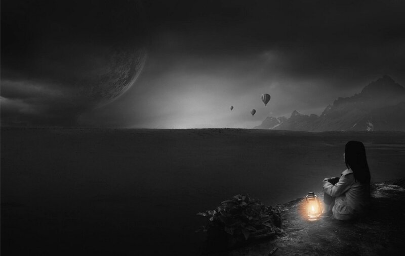 Person Sitting on Cliff — Black