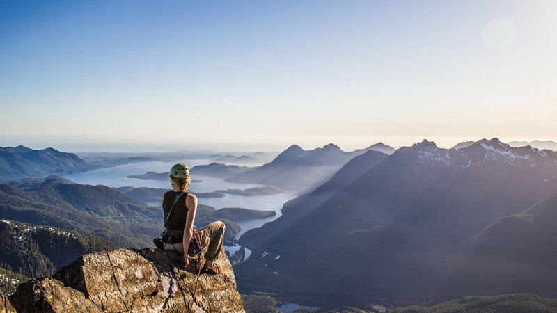 Person Sitting on Cliff — Blue, Serene