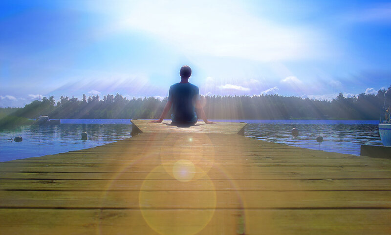 Person Sitting on Dock — Blue, Serene
