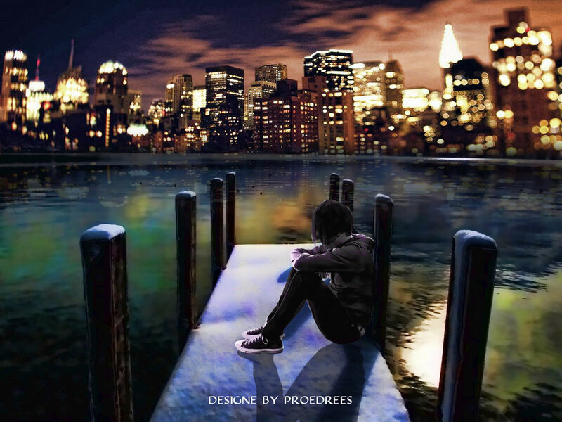 Person Sitting on Dock — Blue